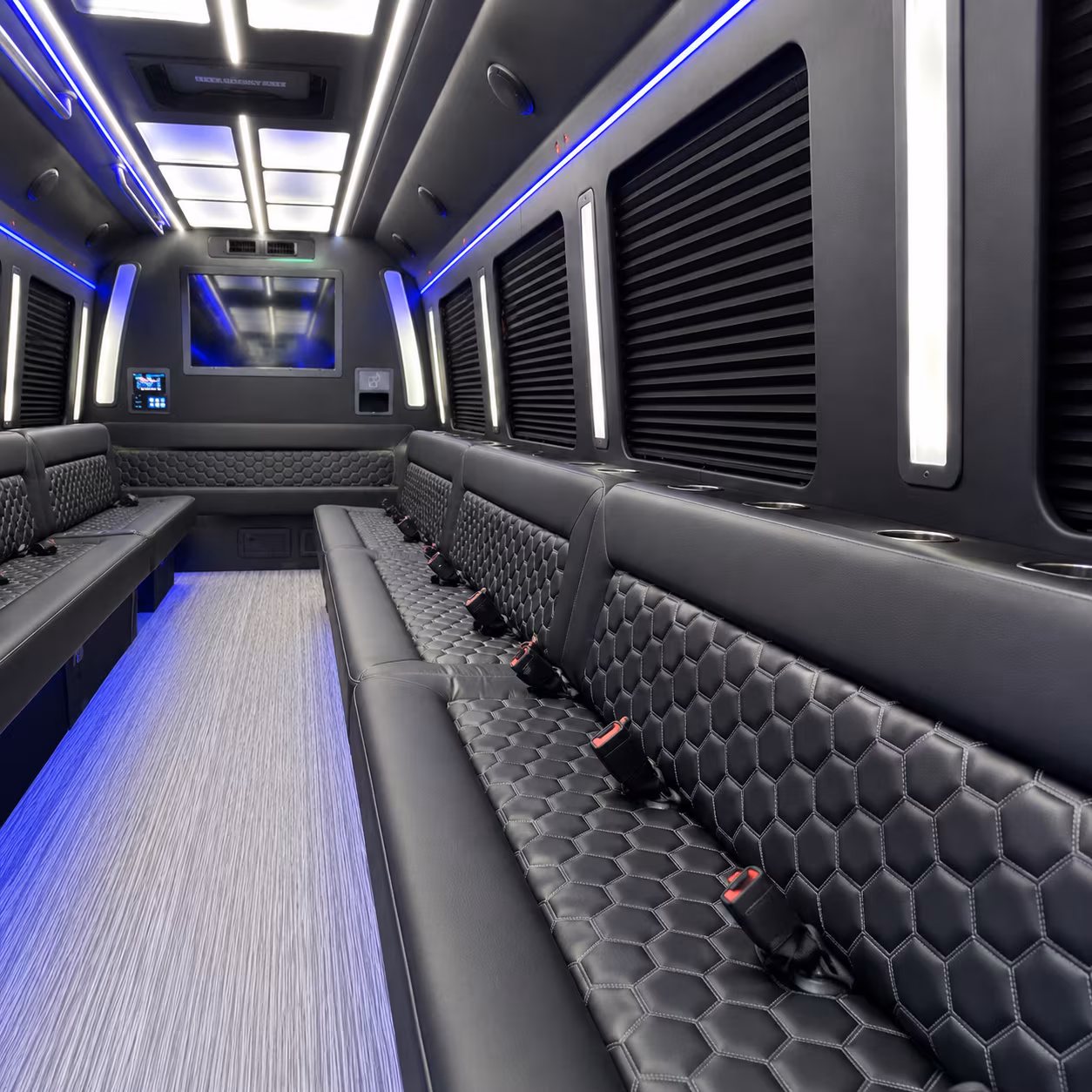 Wedding guests seated inside a party bus serving Stamford